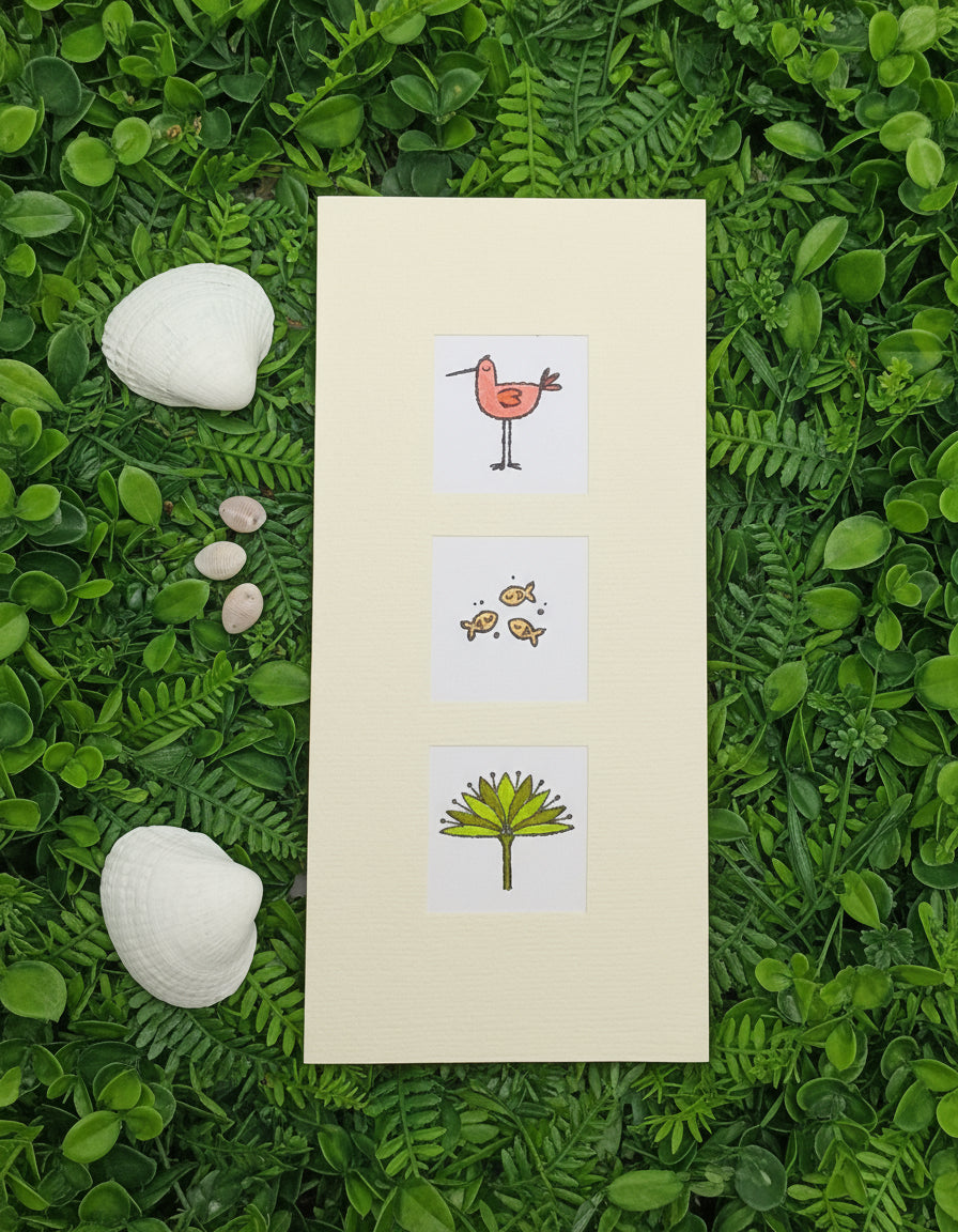 A slimline card with three windows displaying hand-stamped animal images: a bird, a fish, and a tree.