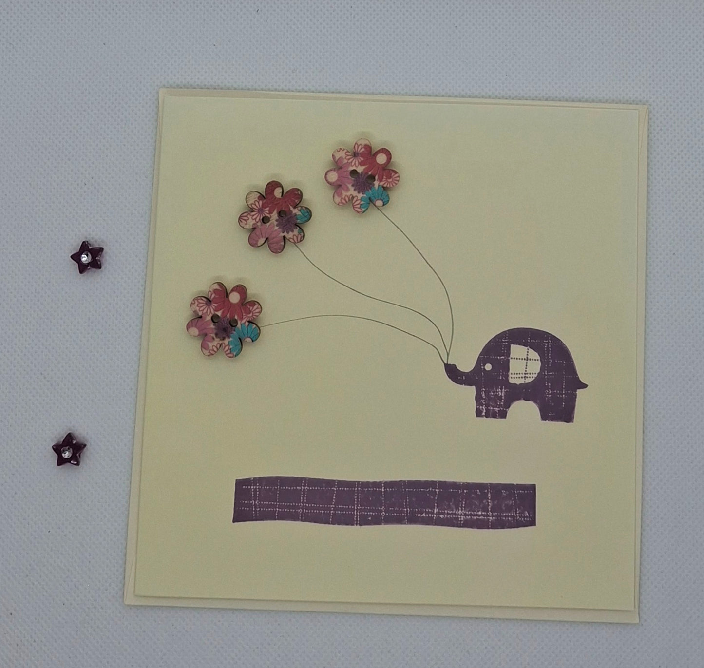 Elephant Holding Buttons Card - Choice of Colours
