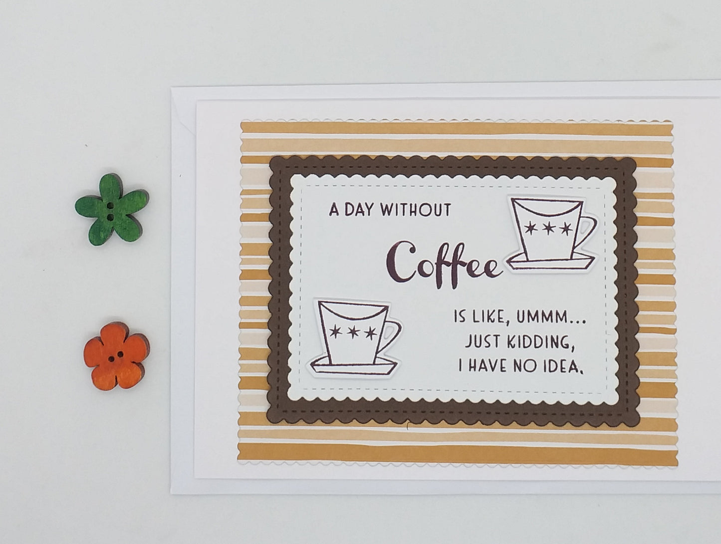 Framed quote about coffee on a wooden table with a cup of coffee.