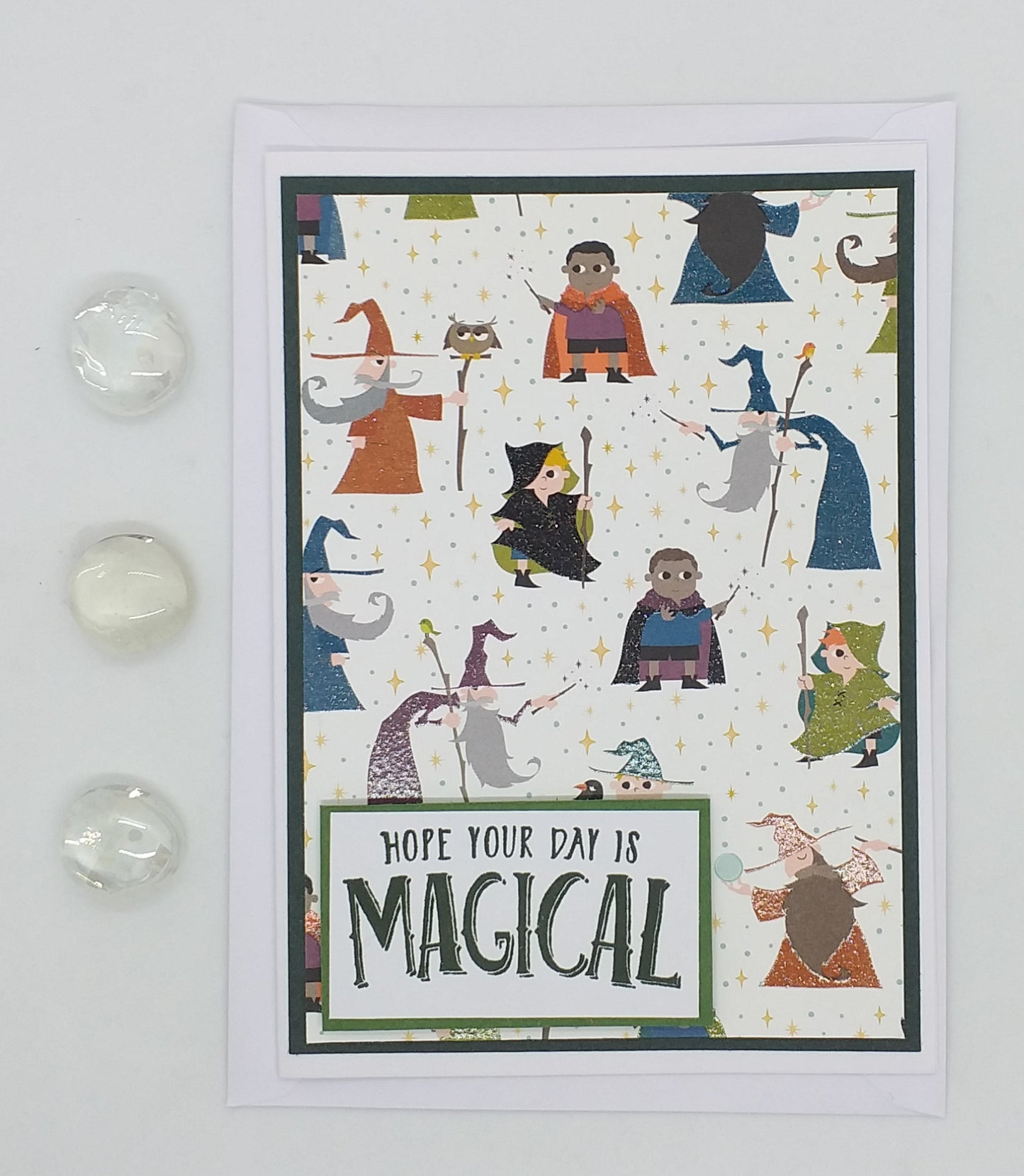 Card with wizard illustrations and 'Hope your day is magical' text on a white background