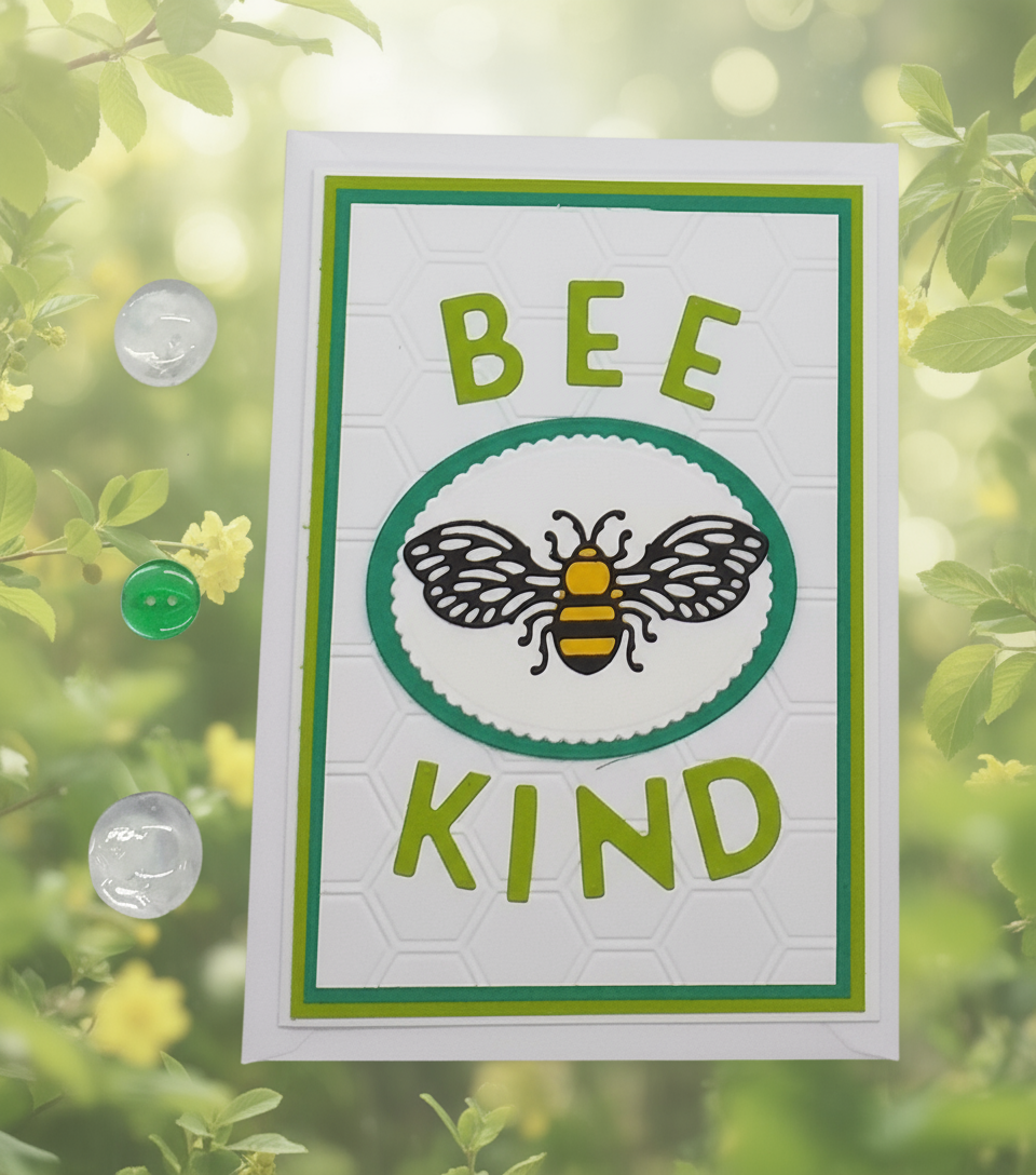 Card with 'Bee Kind' design on a green leafy background